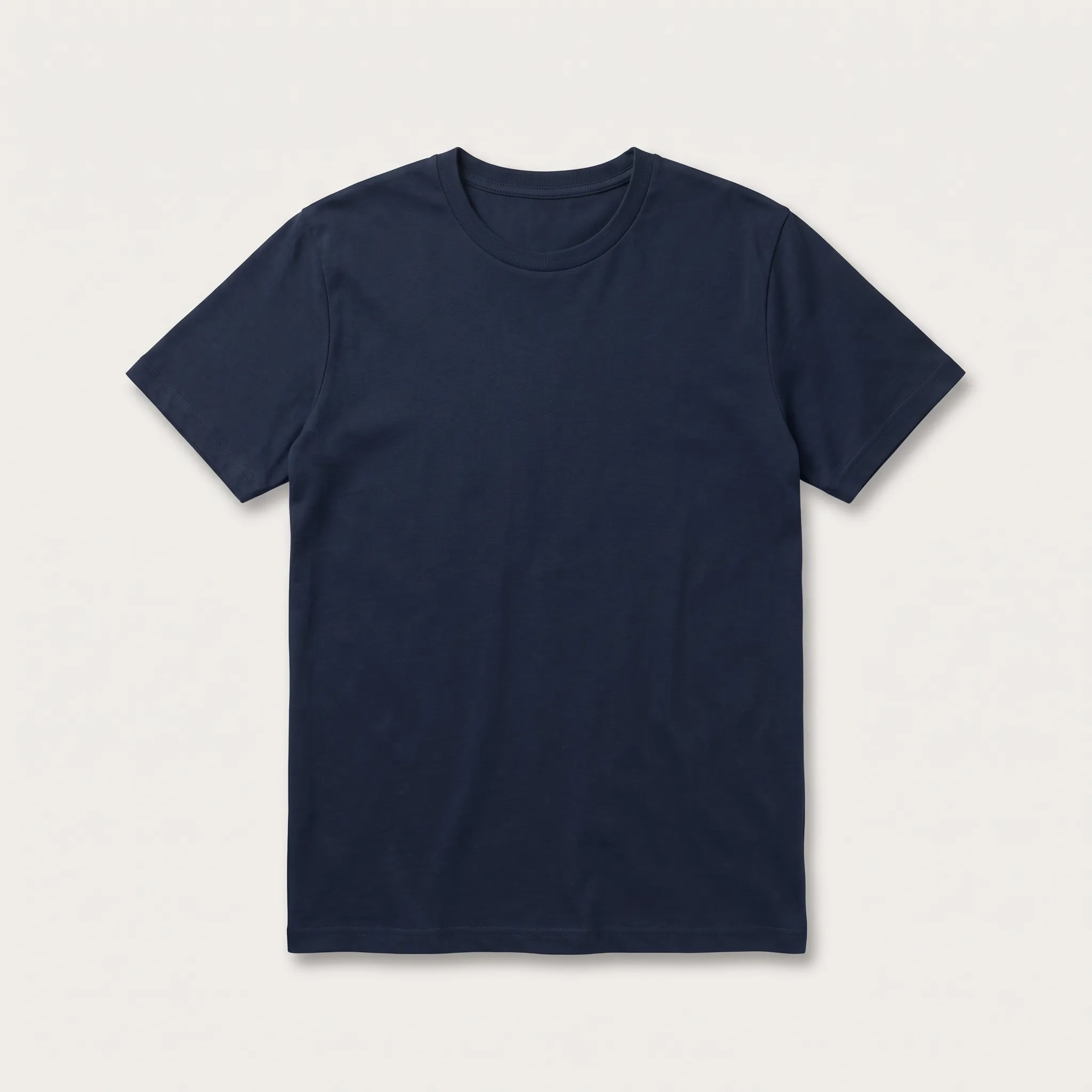 Tampilan depan kaos polos lengan pendek berwarna biru navy atau dongker, diletakkan mendatar di atas latar belakang netral, siap untuk proses custom desain.